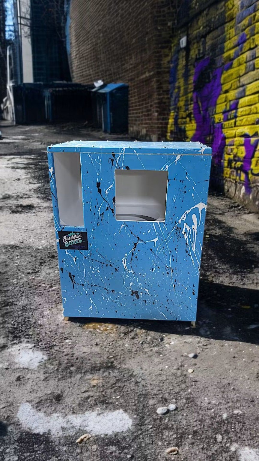 Blue enclosure with white and black splatter finish and a square subwoofer opening