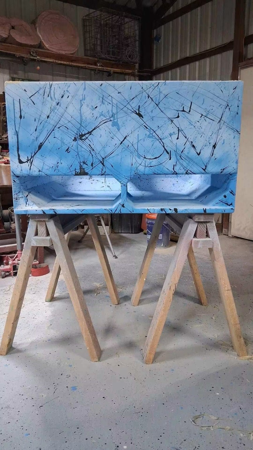 Light blue splatter enclosure with two wide ports in the shop